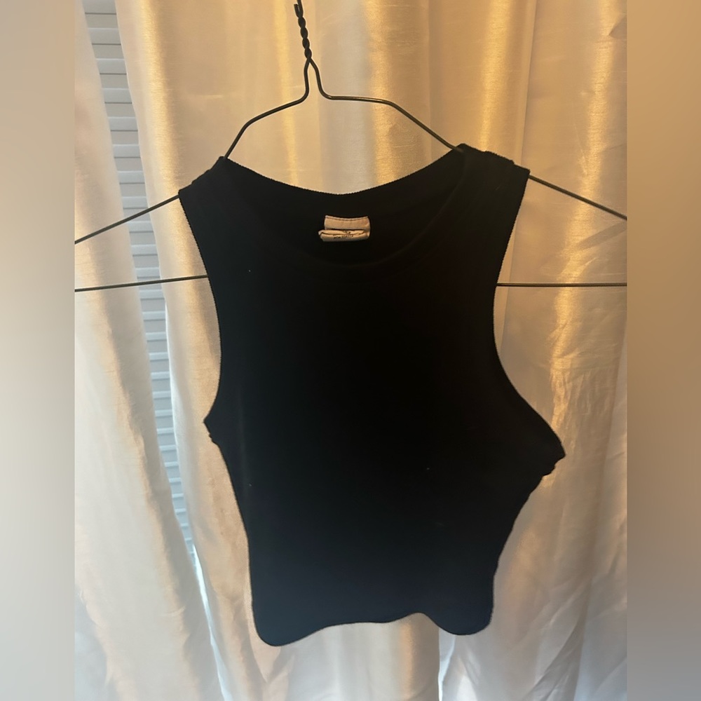 This is a girls black crop top.